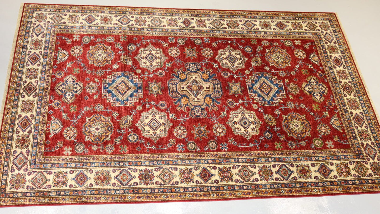 Handmade Rug - 10.1×6.6Ft.